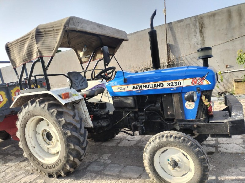 New Holland 323...