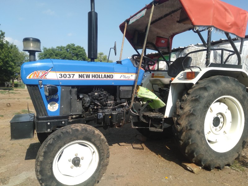 New Holland 303...