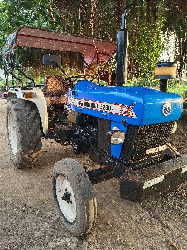 NEW HOLLAND 323...