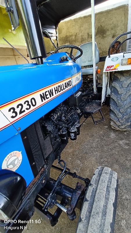 new holland 323...