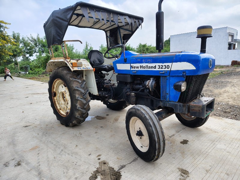 new holland 323...