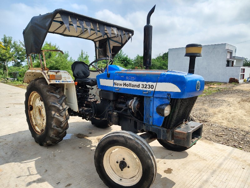 New Holland 323...