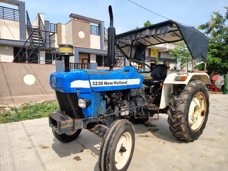 New Holland 323...