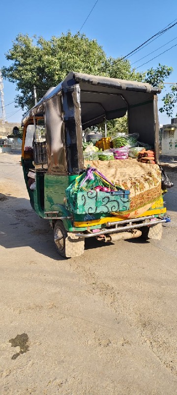 cng riksha 8320...