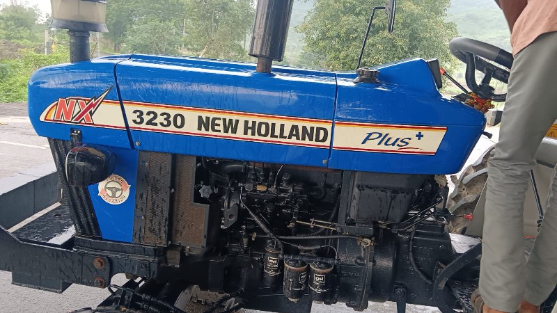 New Holland 323...