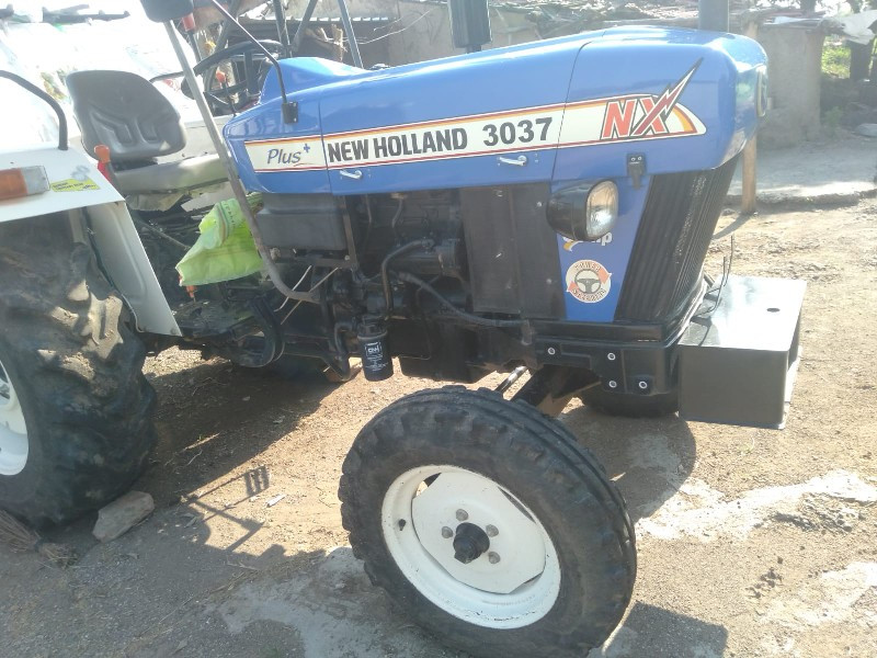 New Holland 303...