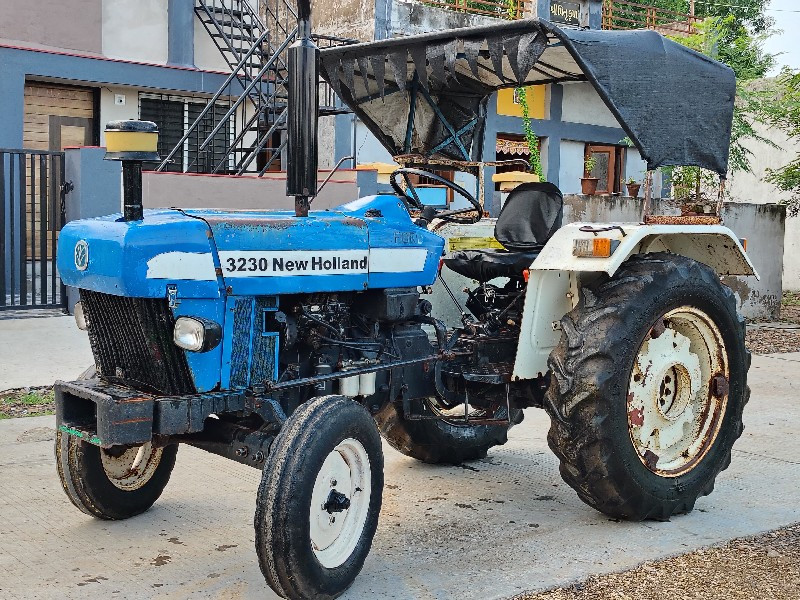 New Holland 323...