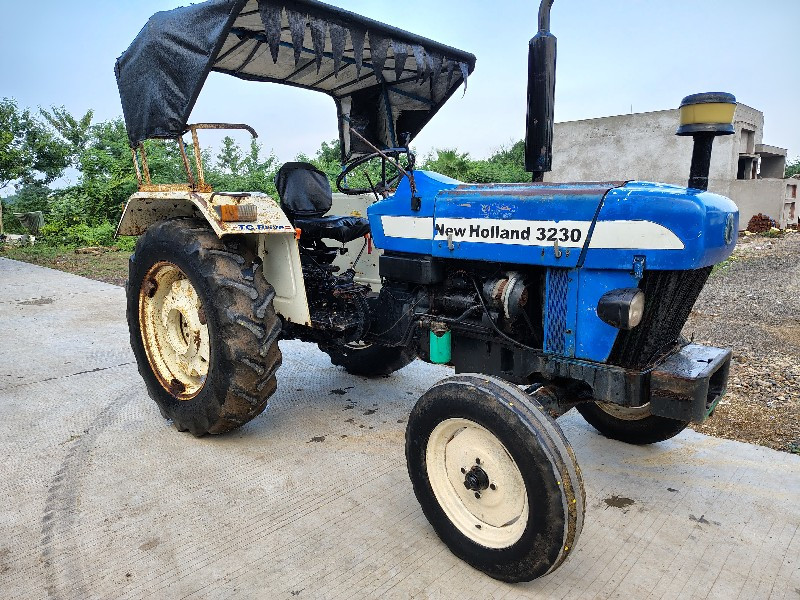 New Holland 323...