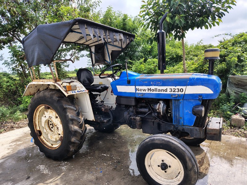 New Holland 323...