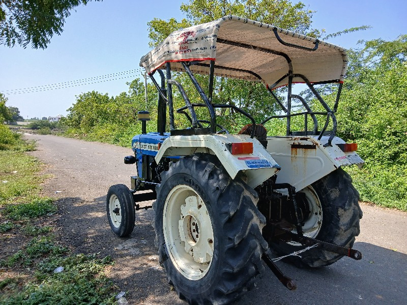 New Holland 303...