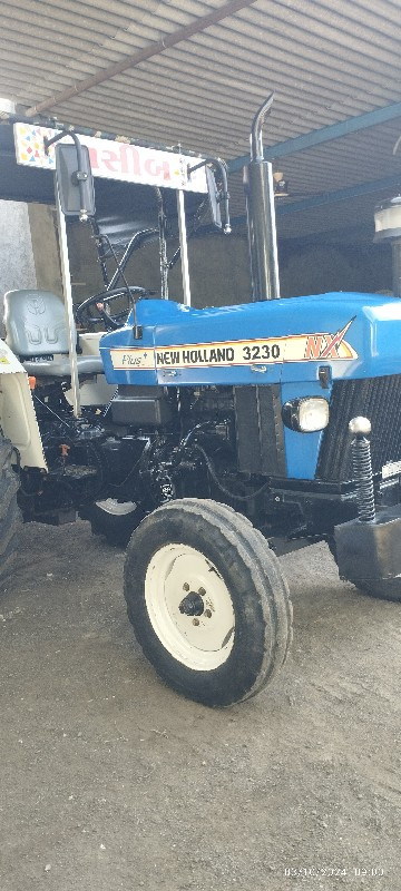 new Holland 323...