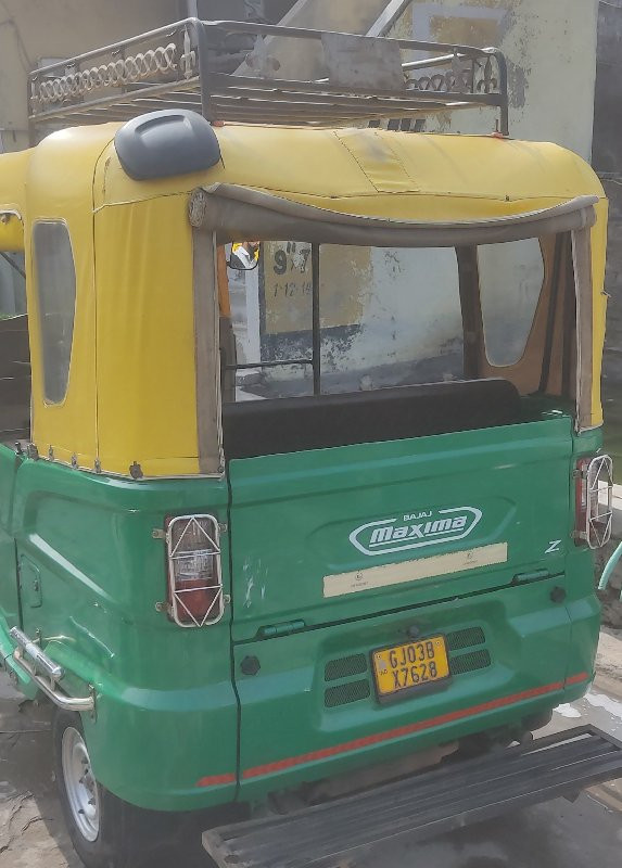 cng riksha maxi...