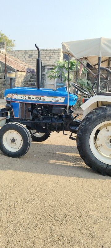 new holland 323...