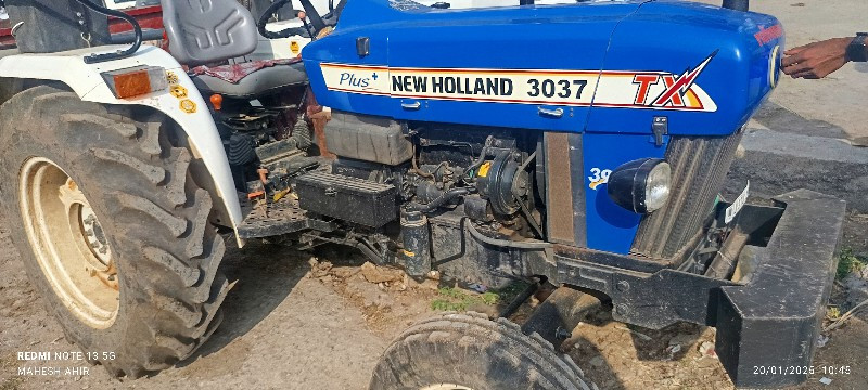 New Holland 303...