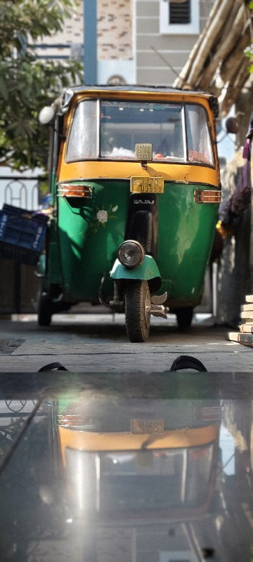 cng riksha 8320...