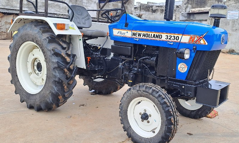 New Holland 323...