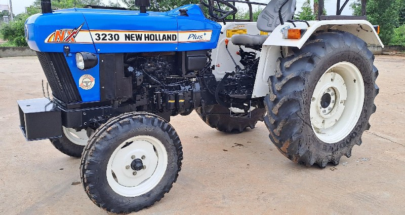 New Holland 323...