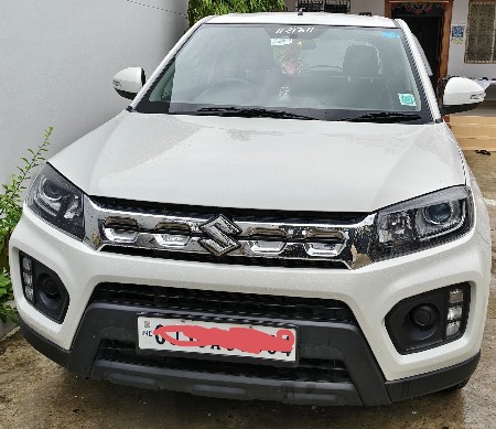 Brezza ગાડી વેચવા ની છે.